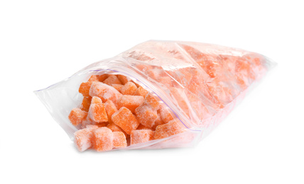Photo of Frozen carrots in plastic bag isolated on white. Vegetable preservation
