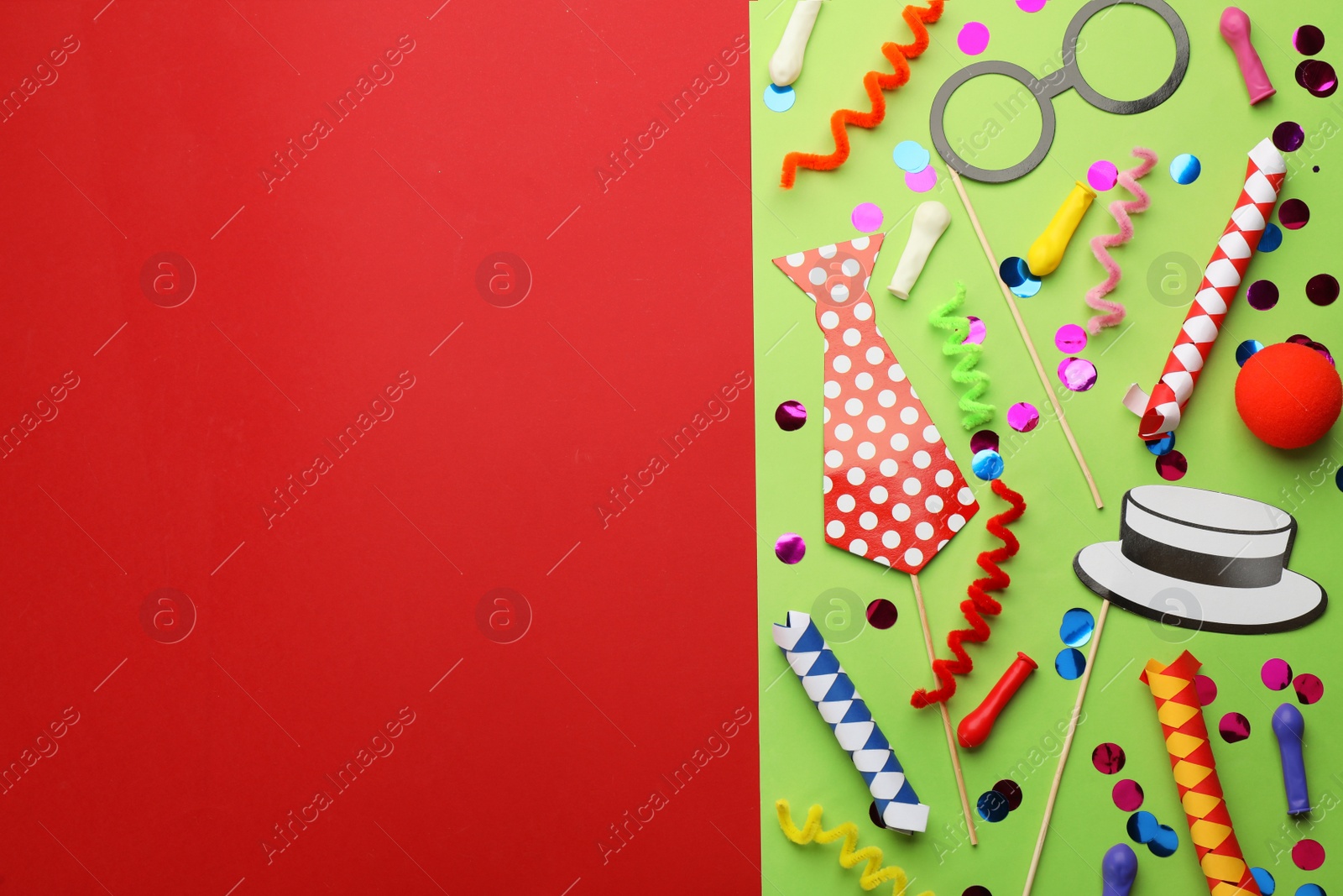 Photo of Flat lay composition with carnival items on color background. Space for text