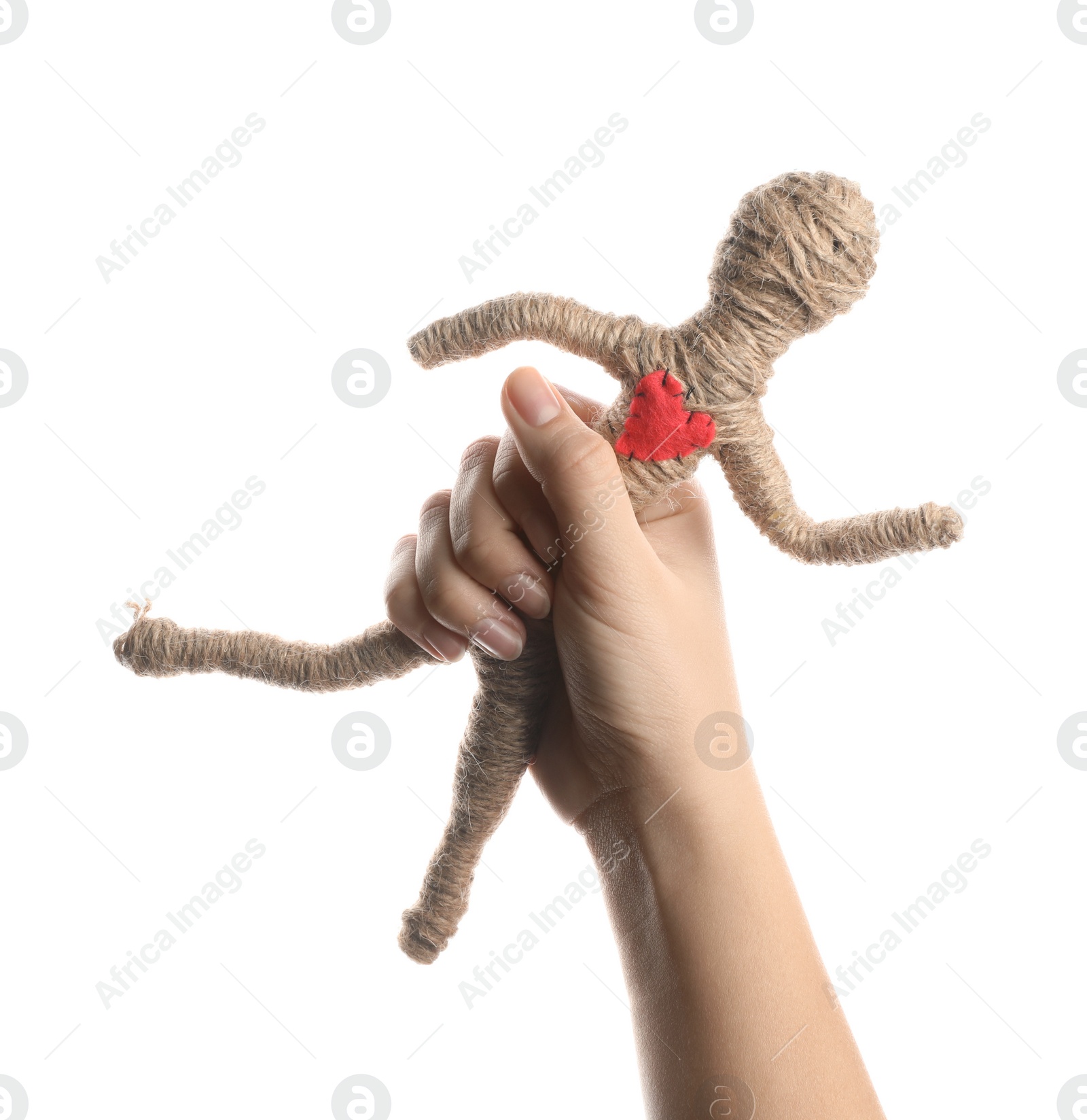 Photo of Woman holding voodoo doll on white background, closeup