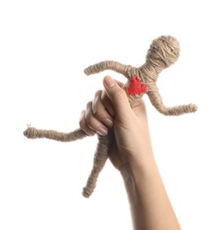 Photo of Woman holding voodoo doll on white background, closeup