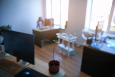 Photo of Defocused bokeh view of modern office interior