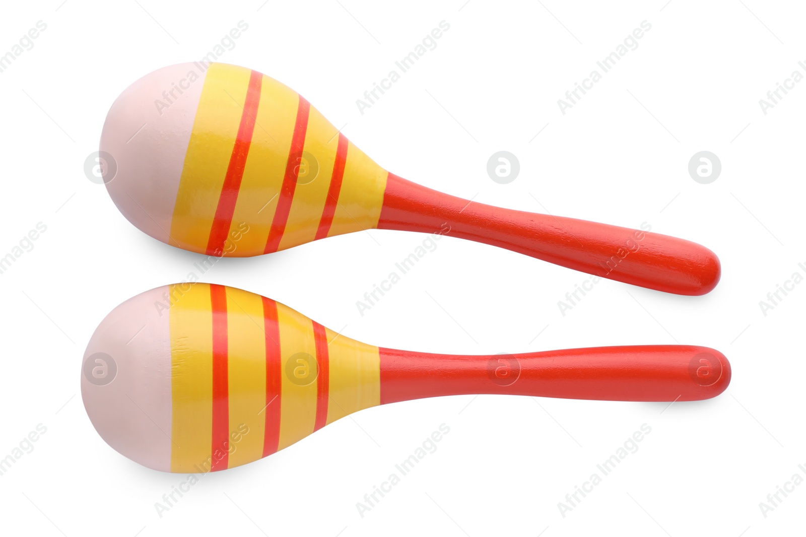 Photo of Colorful maracas on white background, top view. Musical instrument