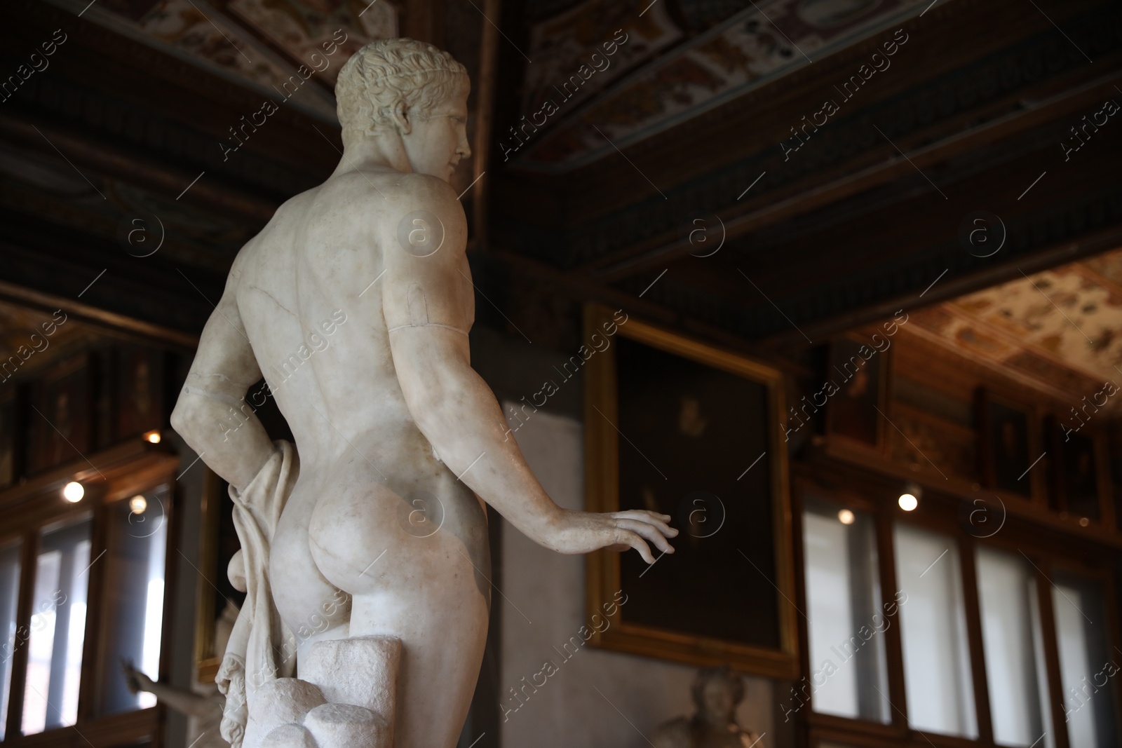 Photo of Florence, Italy - February 8, 2024: Doryphoros statue at Uffizi gallery, low angle view. Space for text