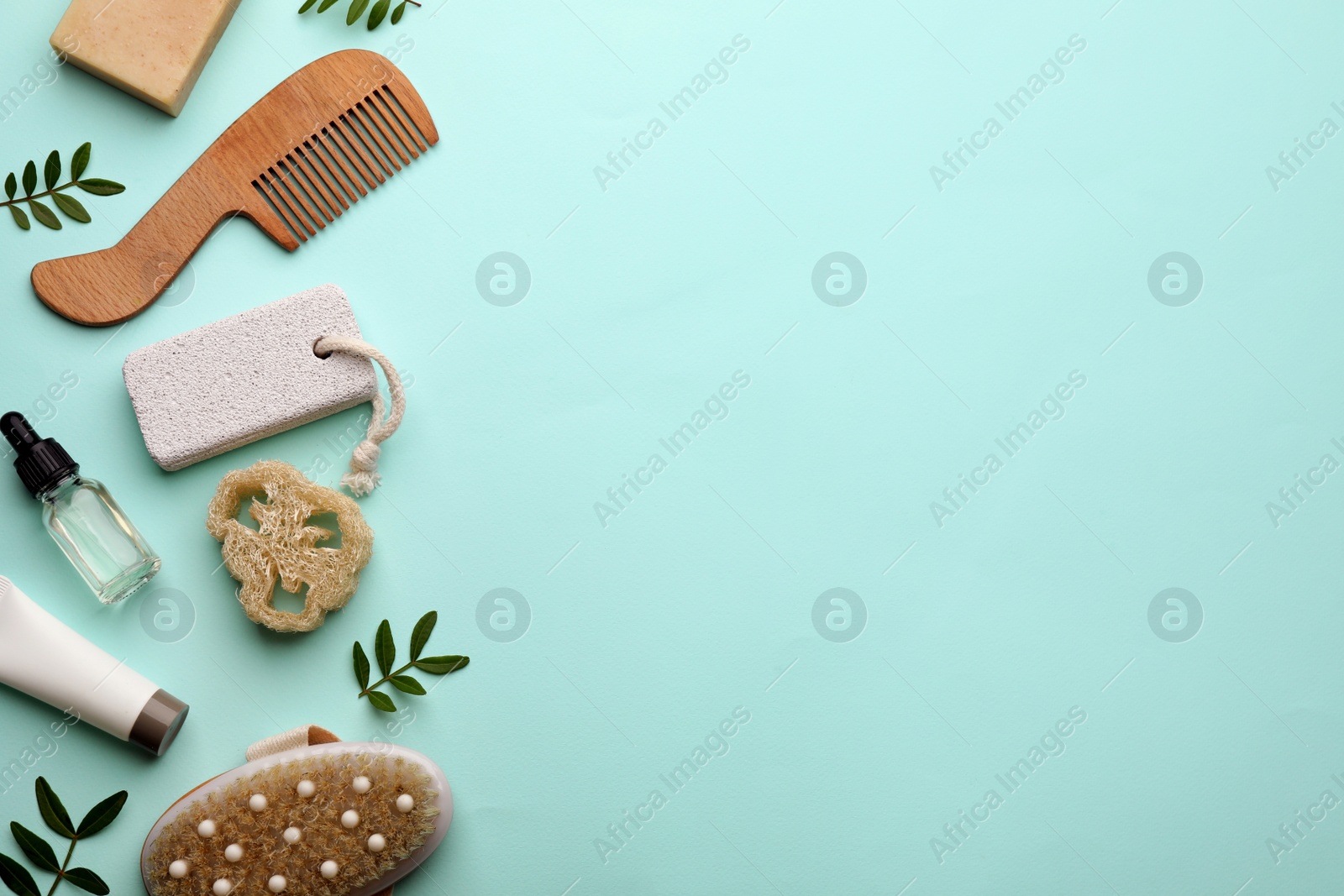 Photo of Flat lay composition with pumice stone on turquoise background. Space for text