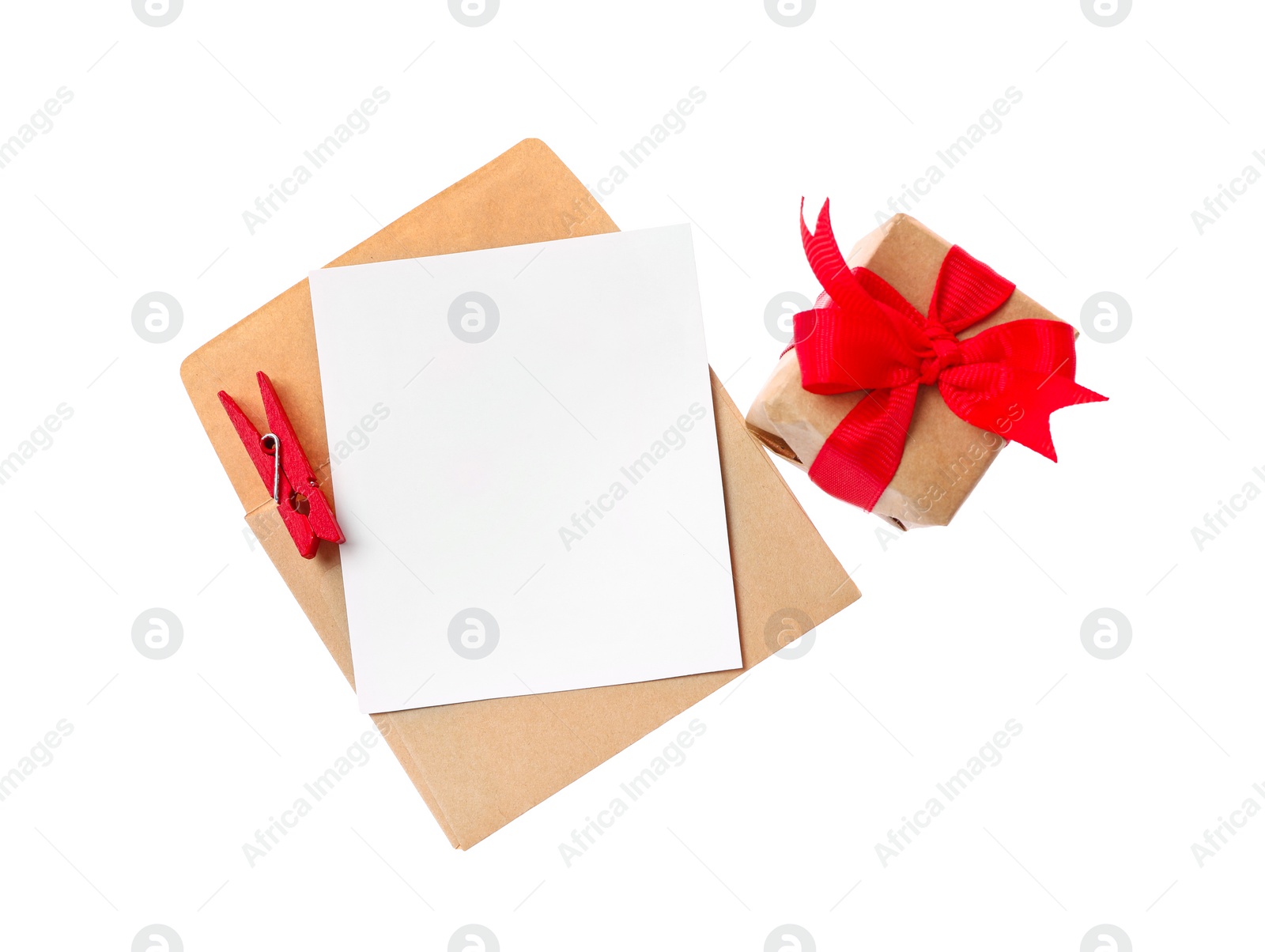 Photo of Blank card, envelope and gift box on white background, top view. Valentine's Day celebration