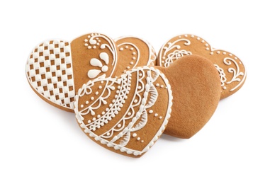 Photo of Tasty heart shaped gingerbread cookies isolated on white