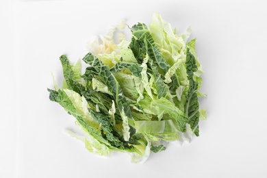 Photo of Pile of chopped fresh green savoy cabbage on white background, top view