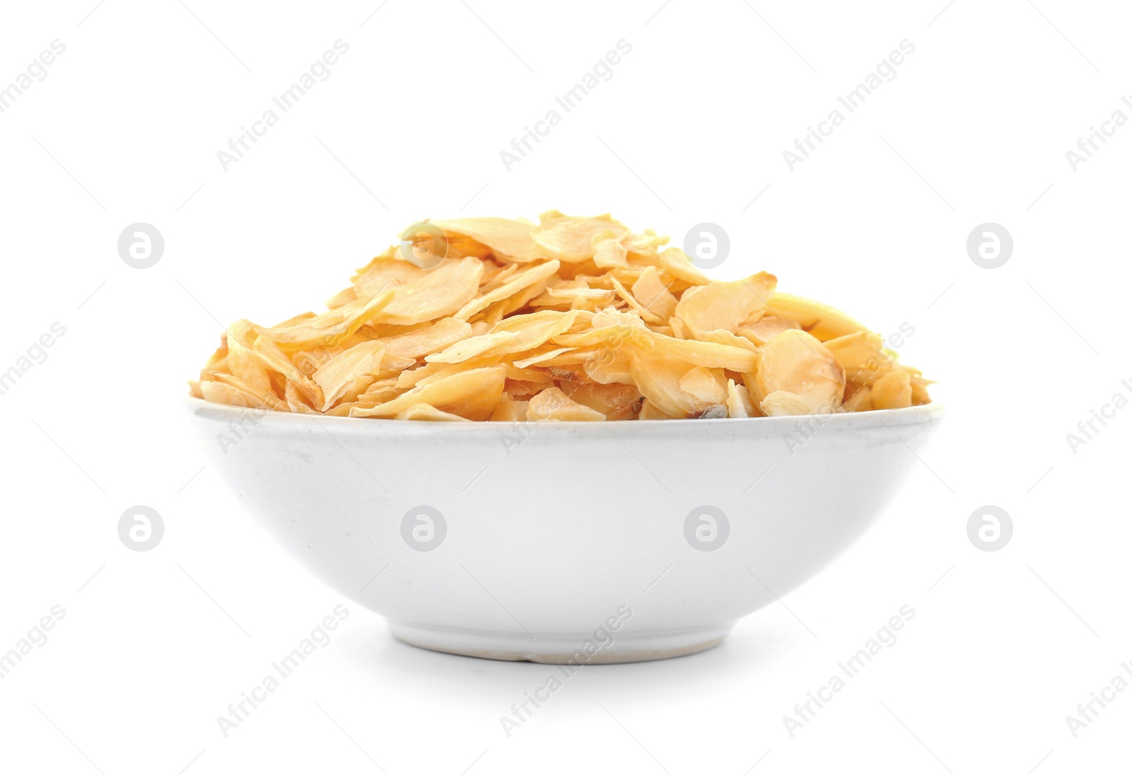 Photo of Dried garlic flakes in bowl on white background