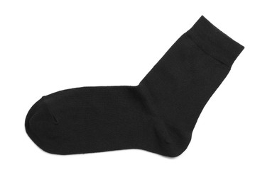 Photo of New black sock isolated on white, top view