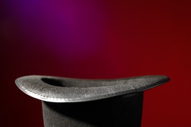 Photo of Magician's hat on color background, space for text