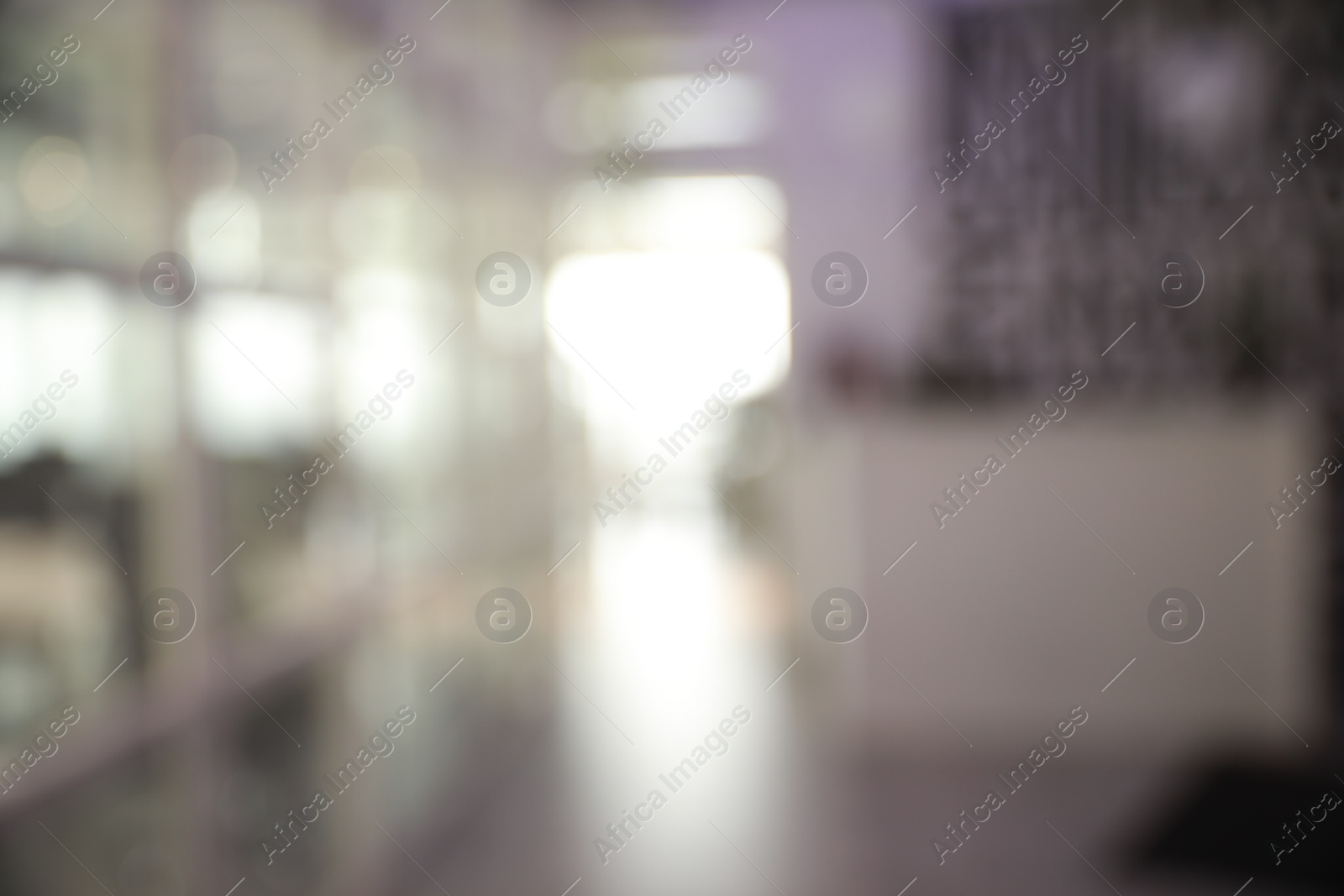 Photo of Blurred view of empty corridor in company