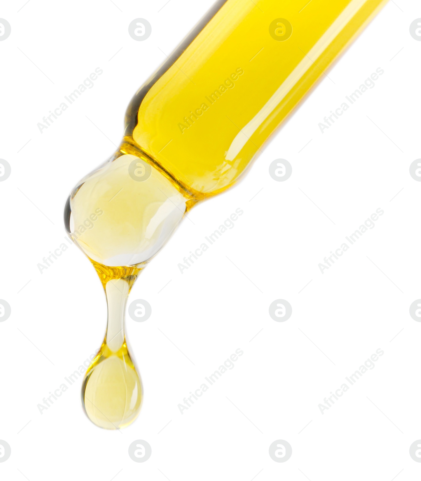 Photo of Dripping tincture from pipette isolated on white