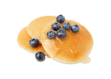 Photo of Tasty pancakes with blueberries and honey isolated on white