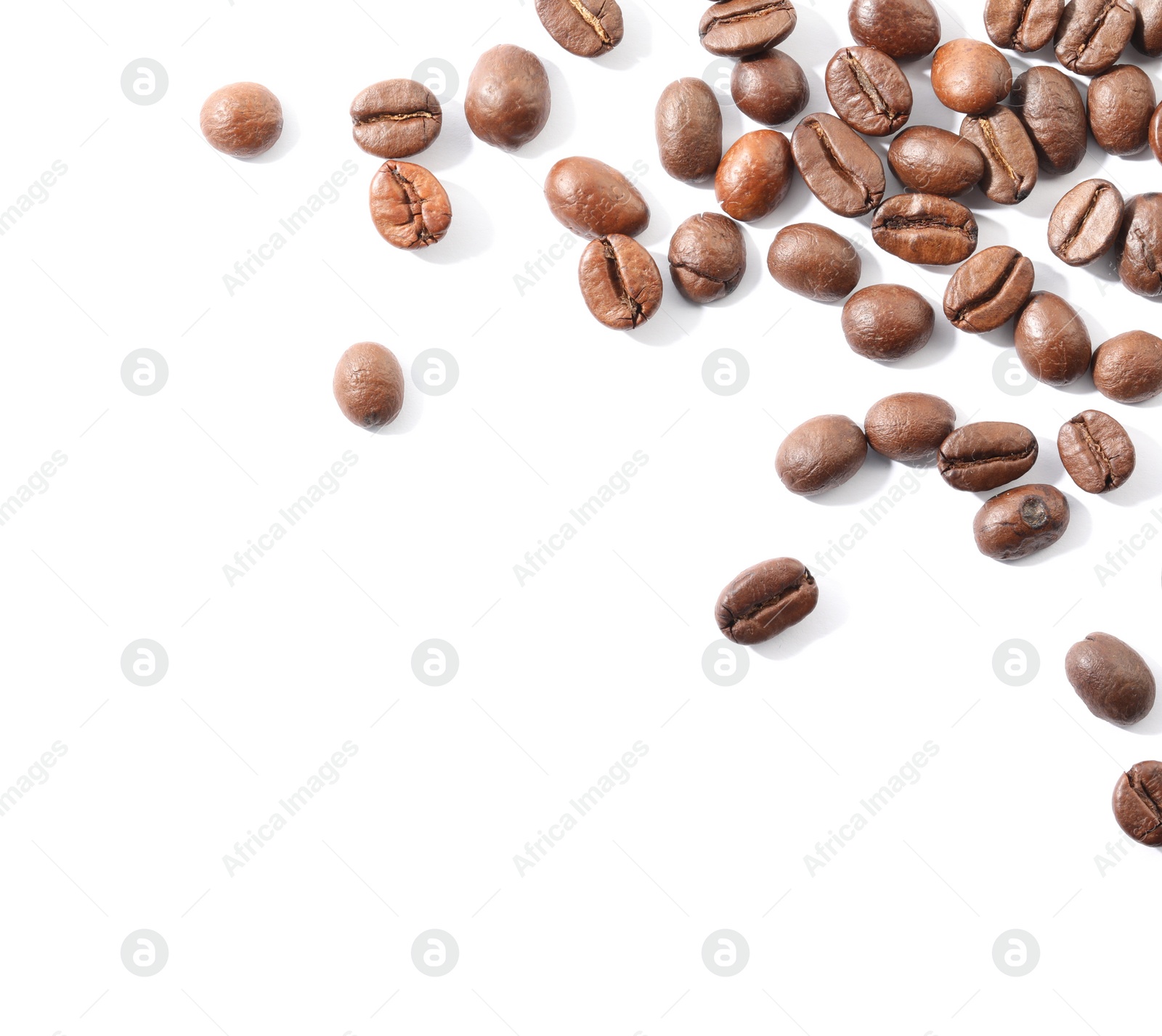 Photo of Many roasted coffee beans isolated on white , top view