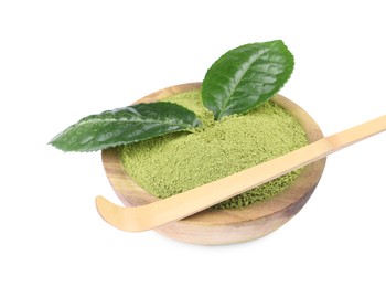 Leaves, bamboo spoon and bowl of matcha powder isolated on white