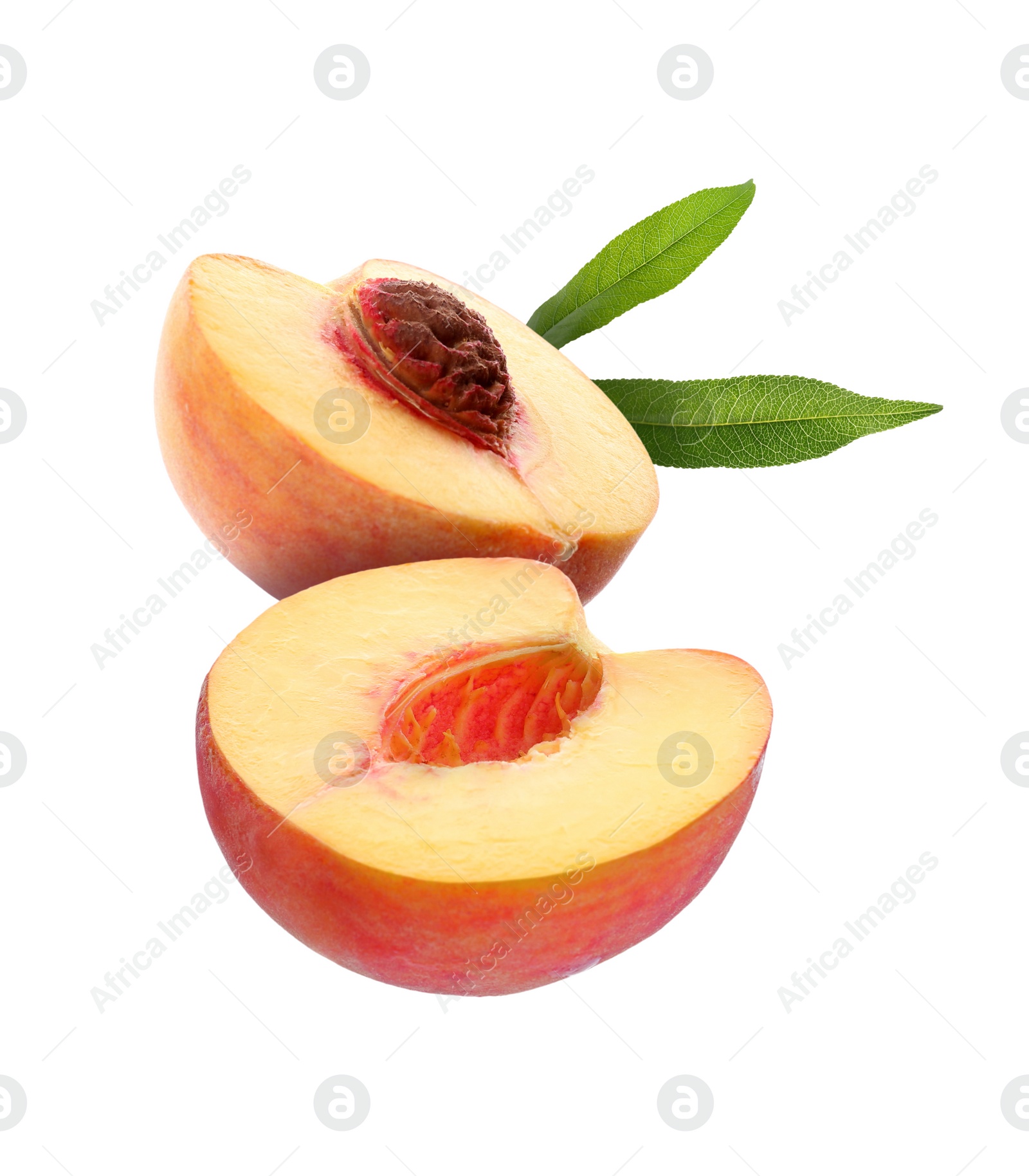 Image of Juicy fresh halved peach with green leaves falling on white background