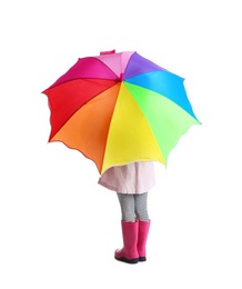 Little girl with rainbow umbrella on white background