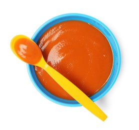 Photo of Delicious baby food in bowl and spoon isolated on white, top view