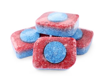 Pile of dishwasher detergent tablets on white background