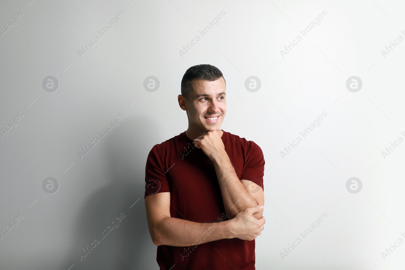 Photo of Portrait of handsome man on white background