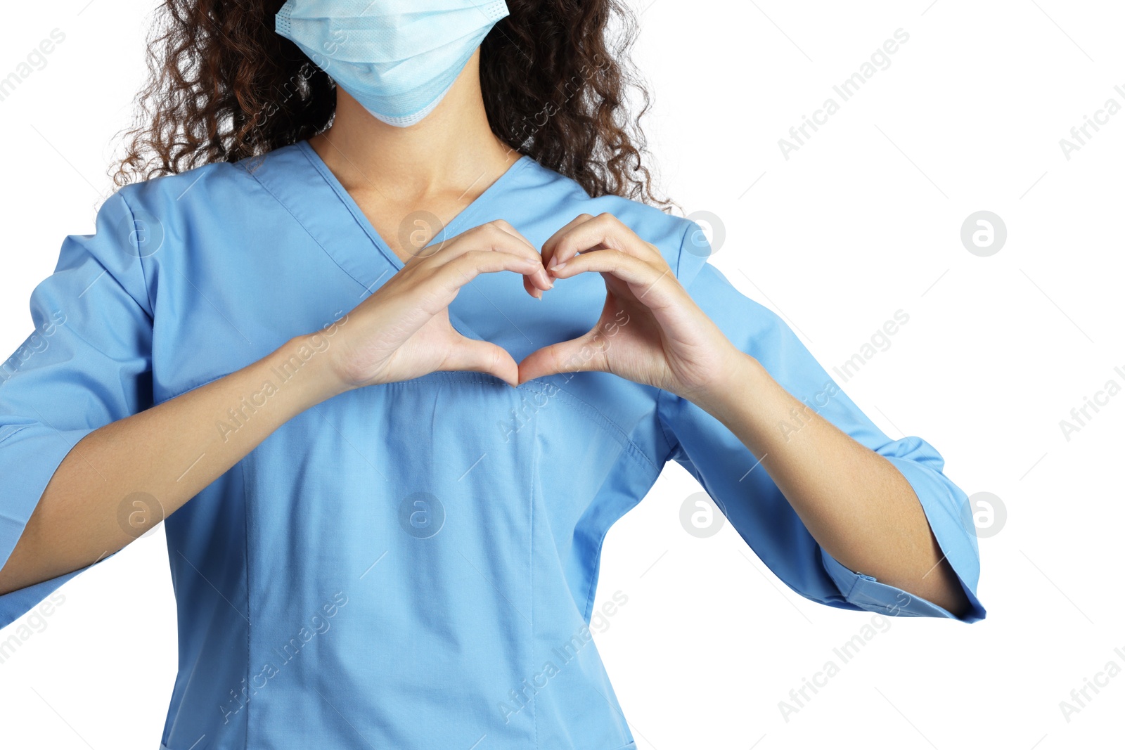 Photo of African-American doctor in protective mask making heart with hands on white background, closeup