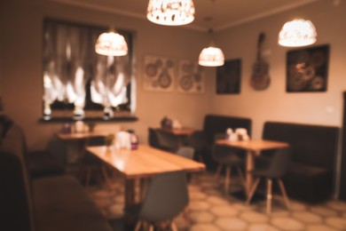 Blurred view of stylish modern cafe interior