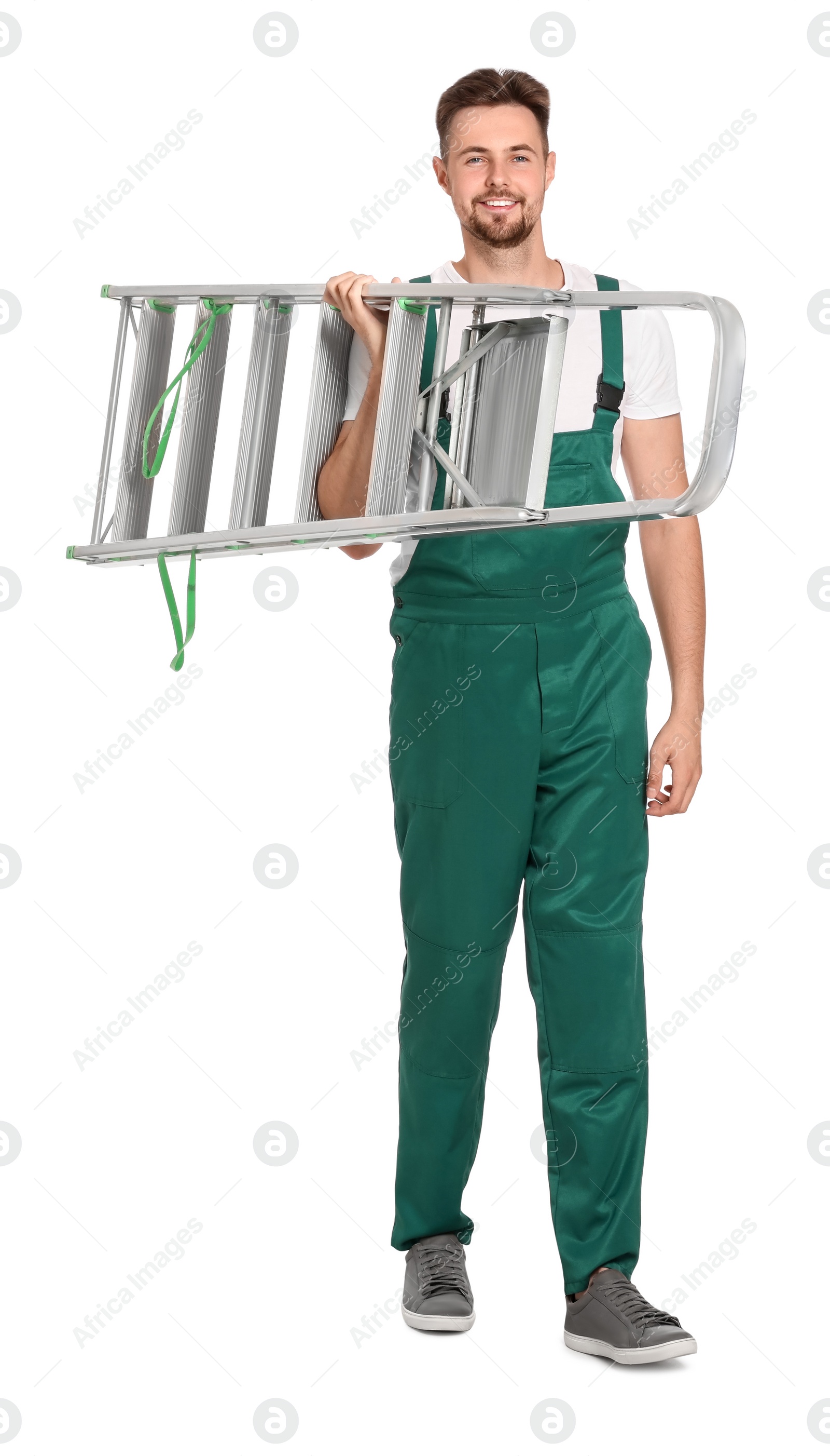 Photo of Worker in uniform holding metal ladder on white background