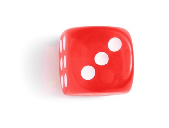 Photo of One red game dice isolated on white, top view