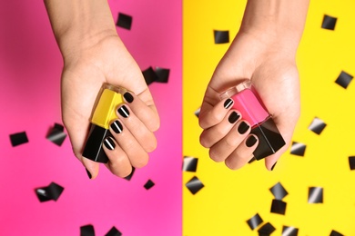 Woman with black manicure holding nail polish bottles on color background, top view
