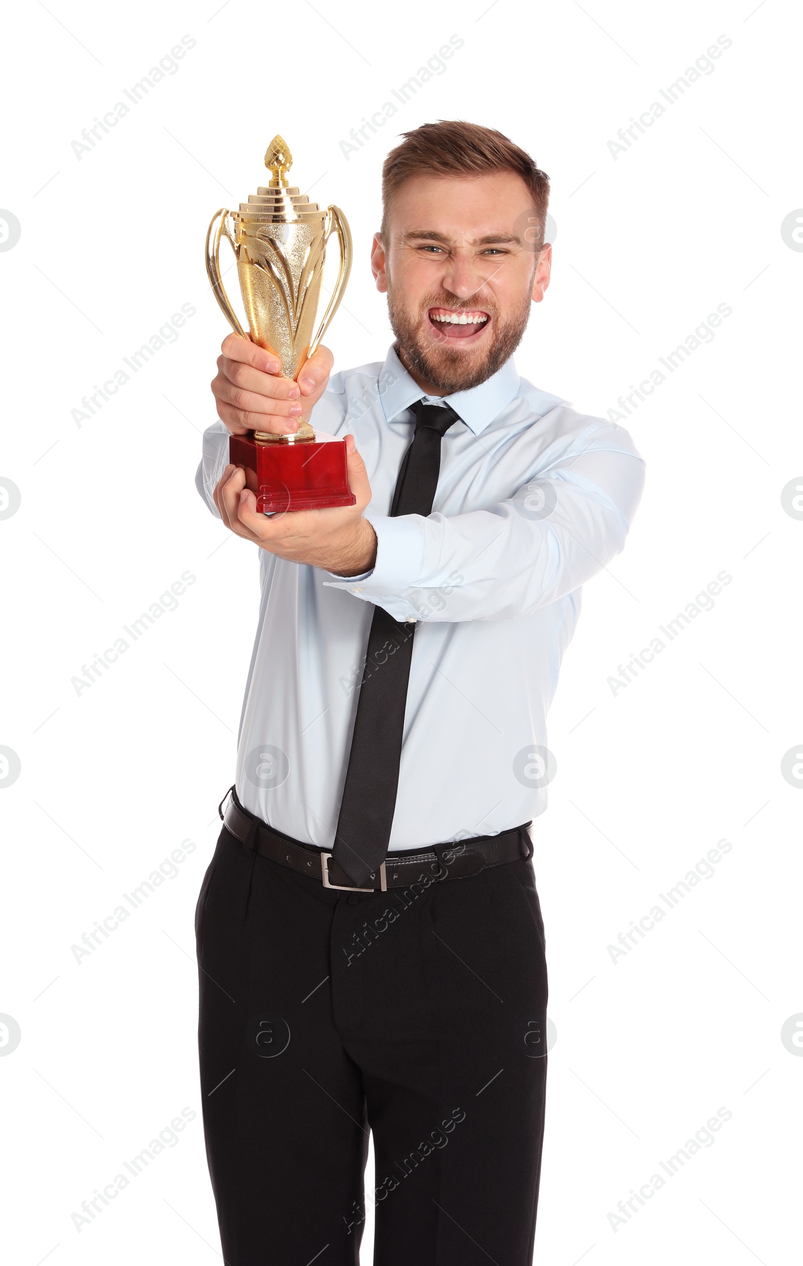 Photo of Portrait of happy young businessman with gold trophy cup on white background