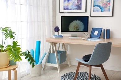 Modern workplace interior with computer on table