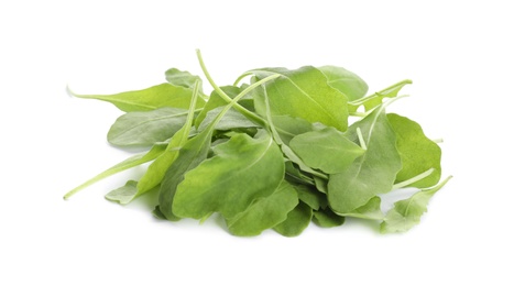 Photo of Fresh green arugula leaves on white background