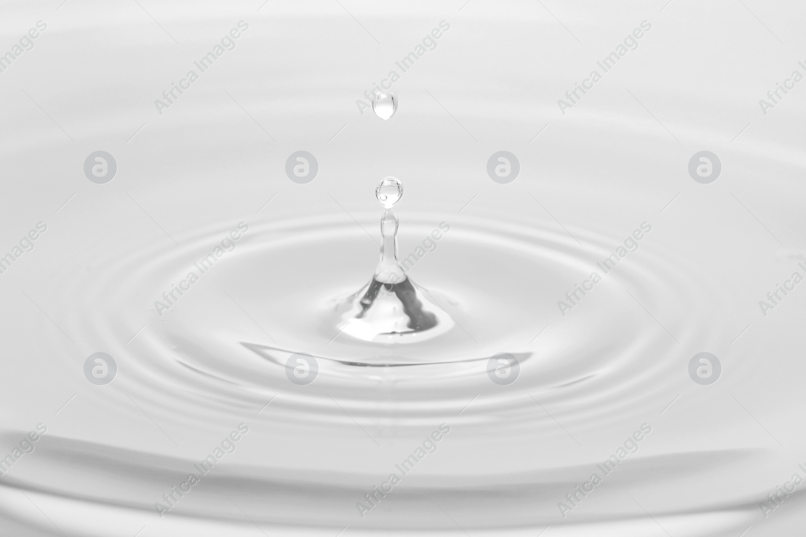 Image of Splash of water with drop, closeup view