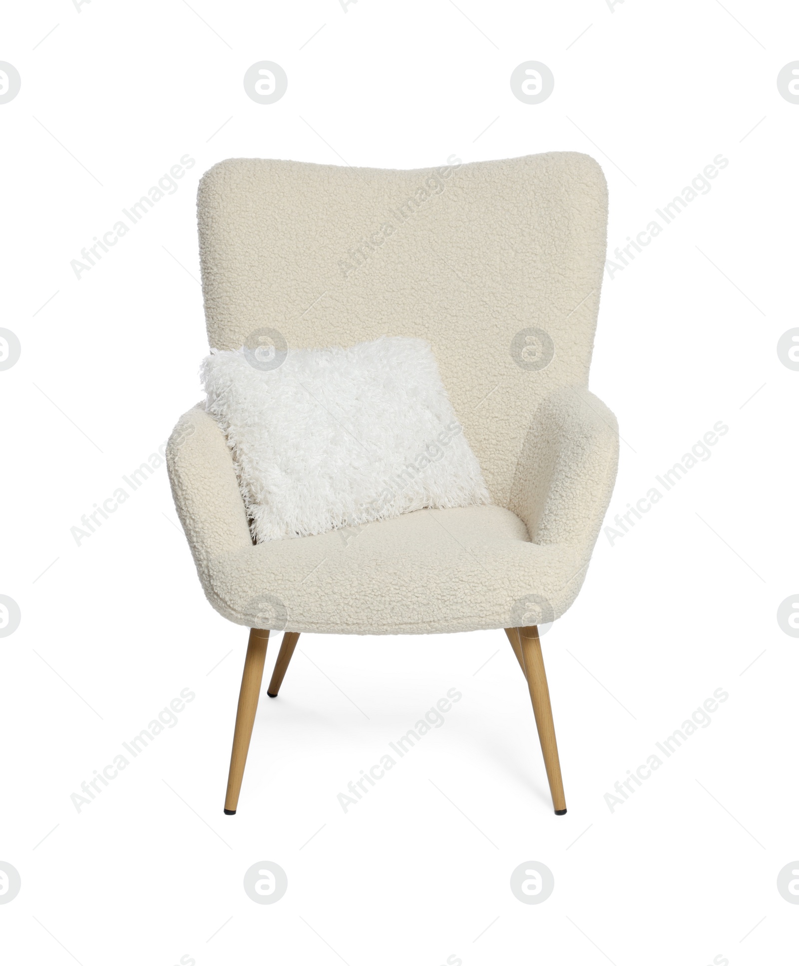 Photo of One stylish comfortable armchair with pillow isolated on white