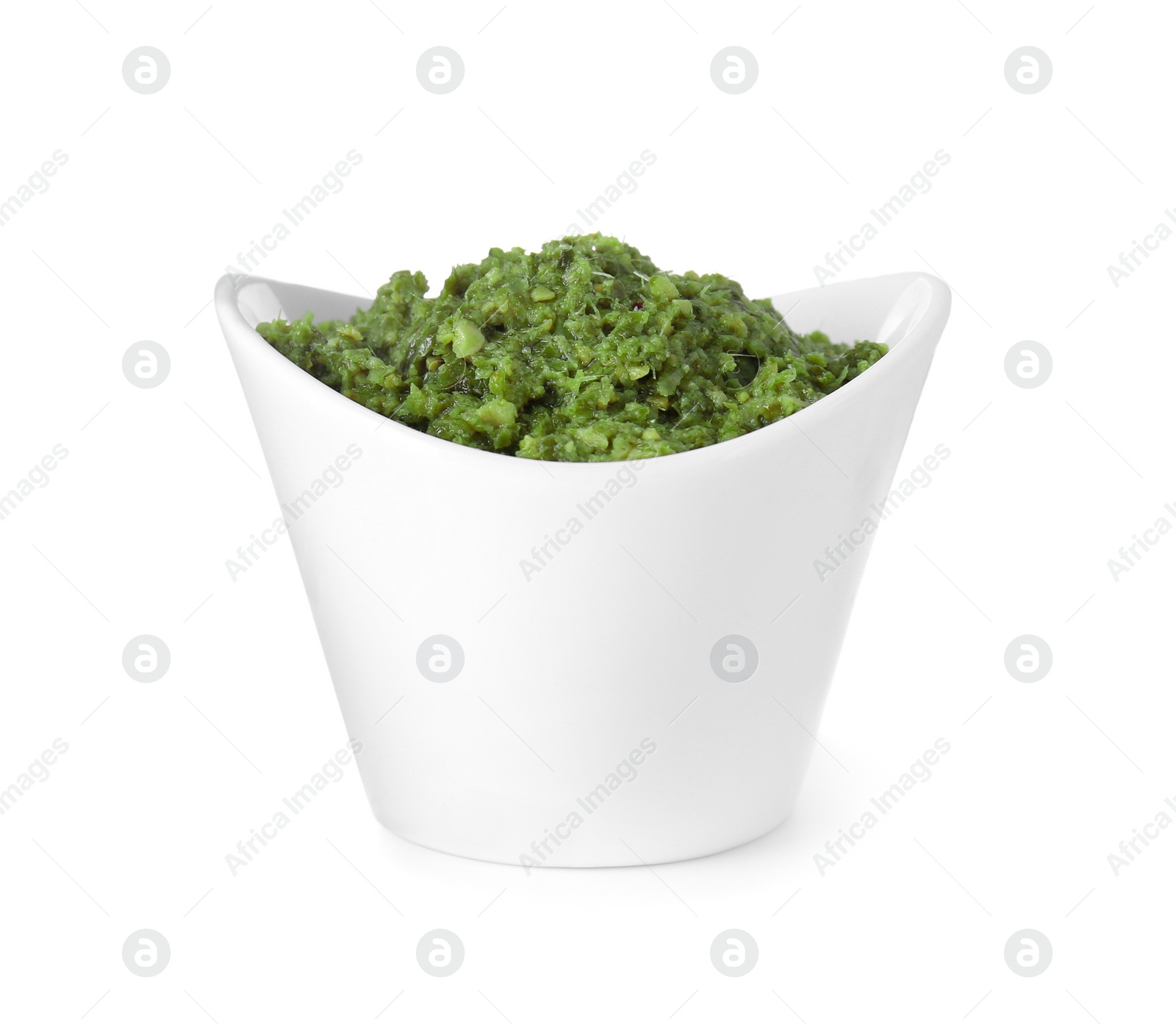 Photo of Delicious pesto sauce in bowl isolated on white