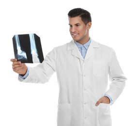 Photo of Orthopedist holding X-ray picture on white background