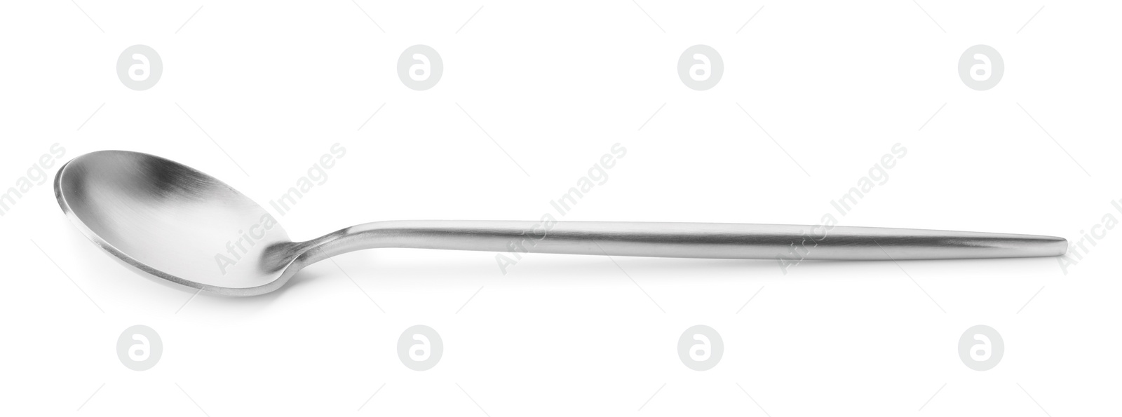 Photo of One shiny silver spoon isolated on white