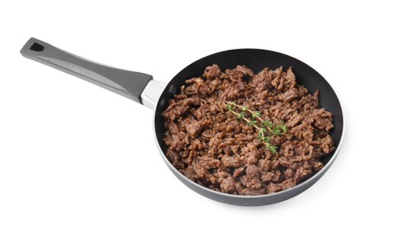 Photo of Fried ground meat and thyme in frying pan isolated on white