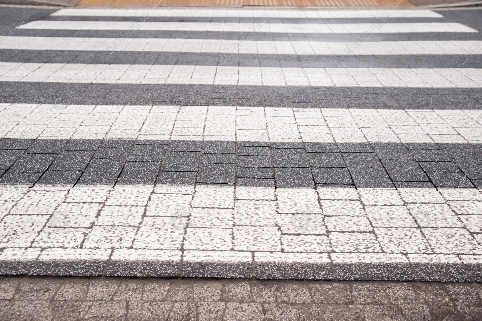 Photo of View on pedestrian crossing in city. Road regulations