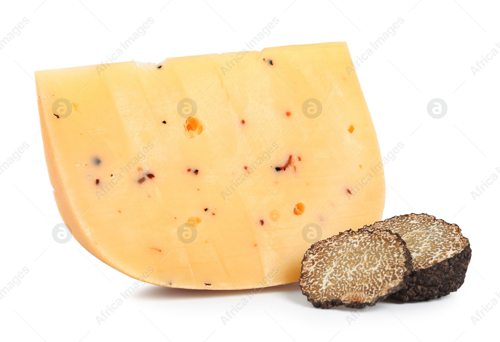 Photo of Piece of delicious cheese with cut black truffle on white background