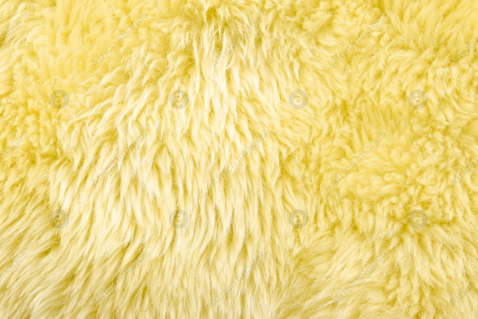 Image of Texture of yellow faux fur as background, closeup