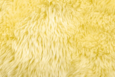 Image of Texture of yellow faux fur as background, closeup