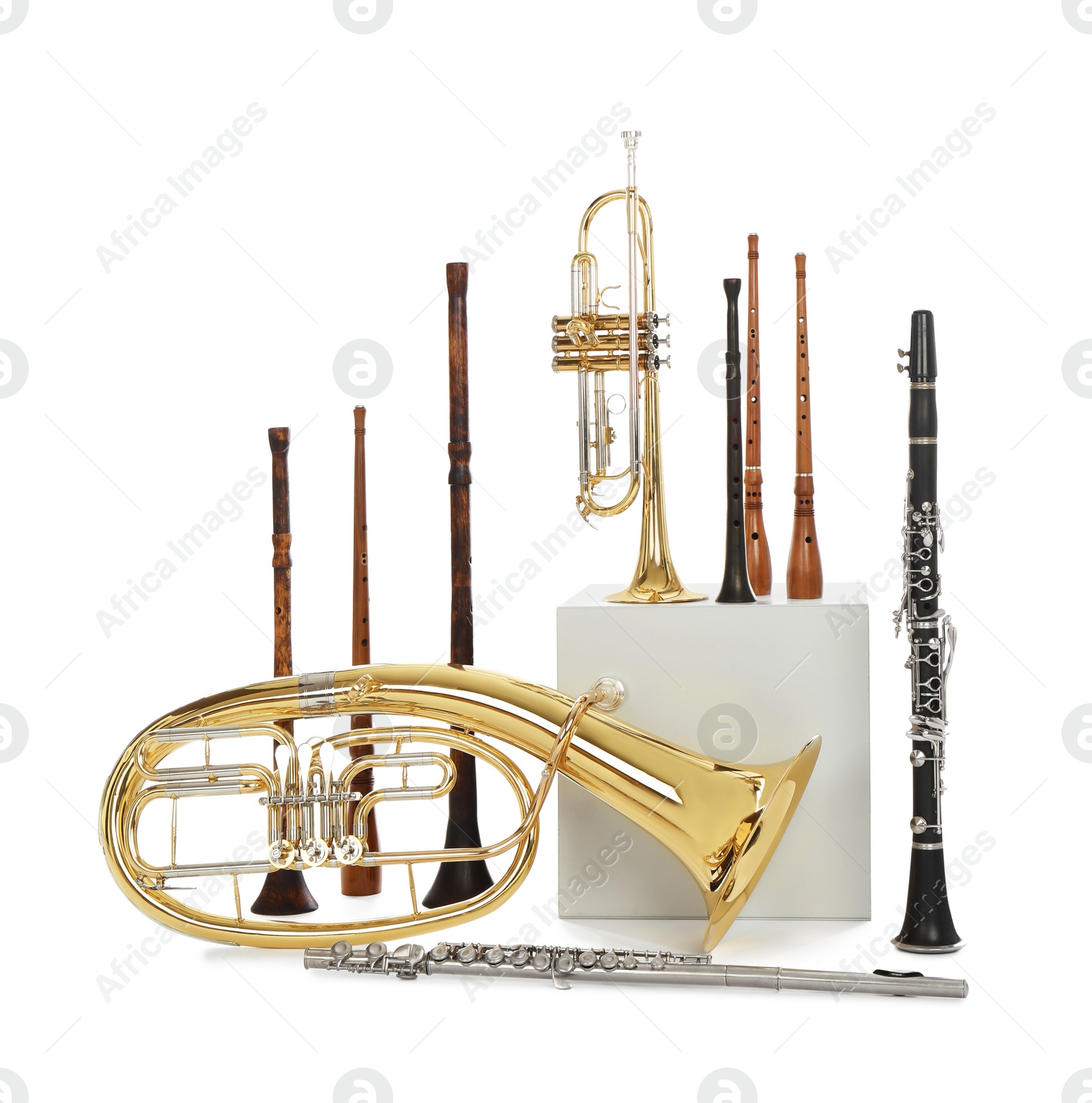 Photo of Set of wind musical instruments on white background