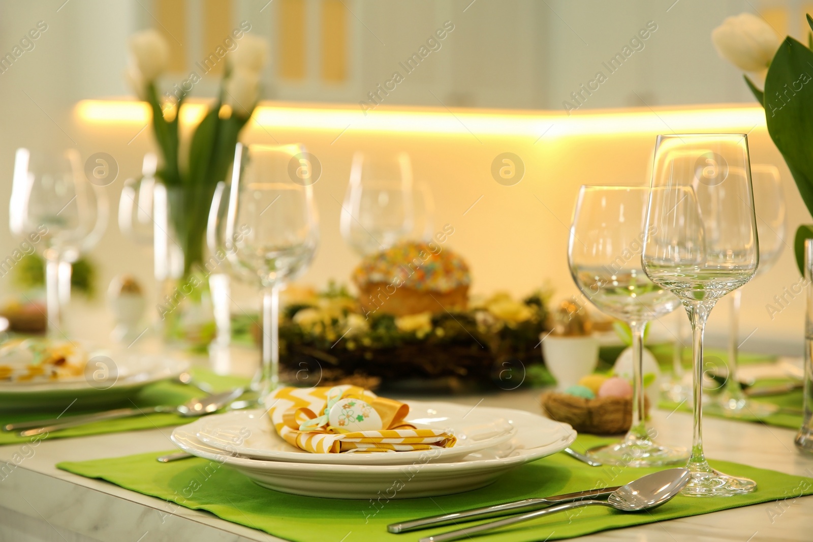 Photo of Beautiful festive Easter table setting with eggs