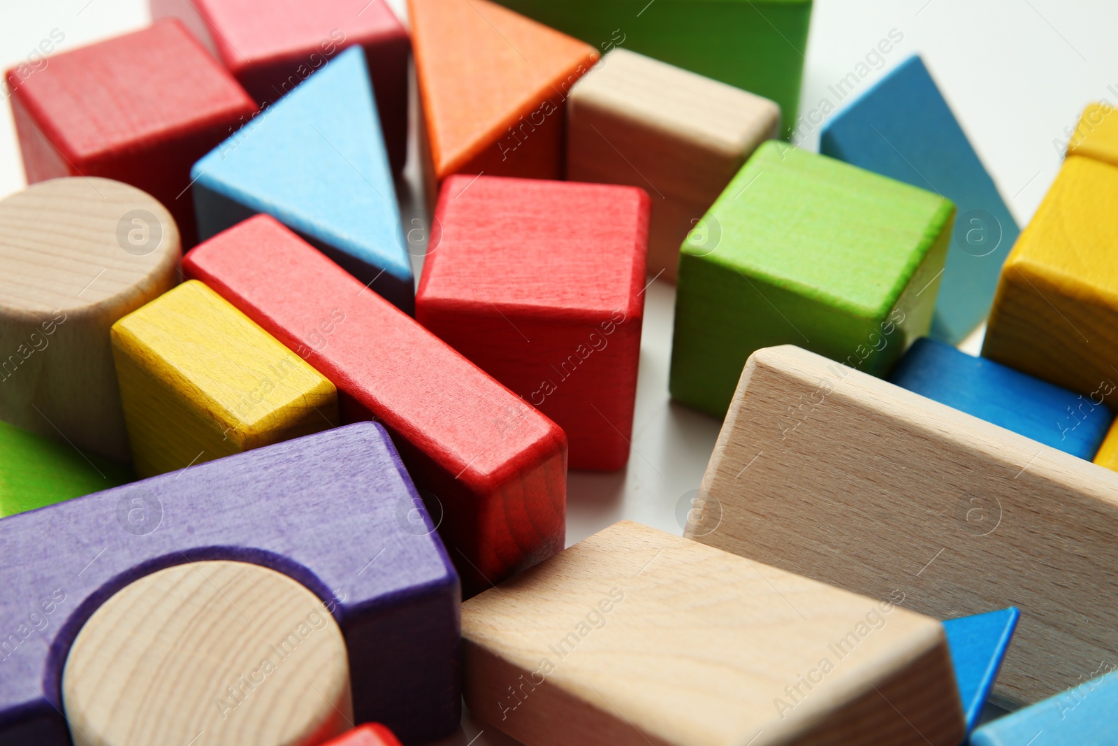 Photo of Wooden construction set on white background, closeup