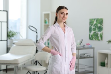 Professional cosmetologist in medical uniform in clinic