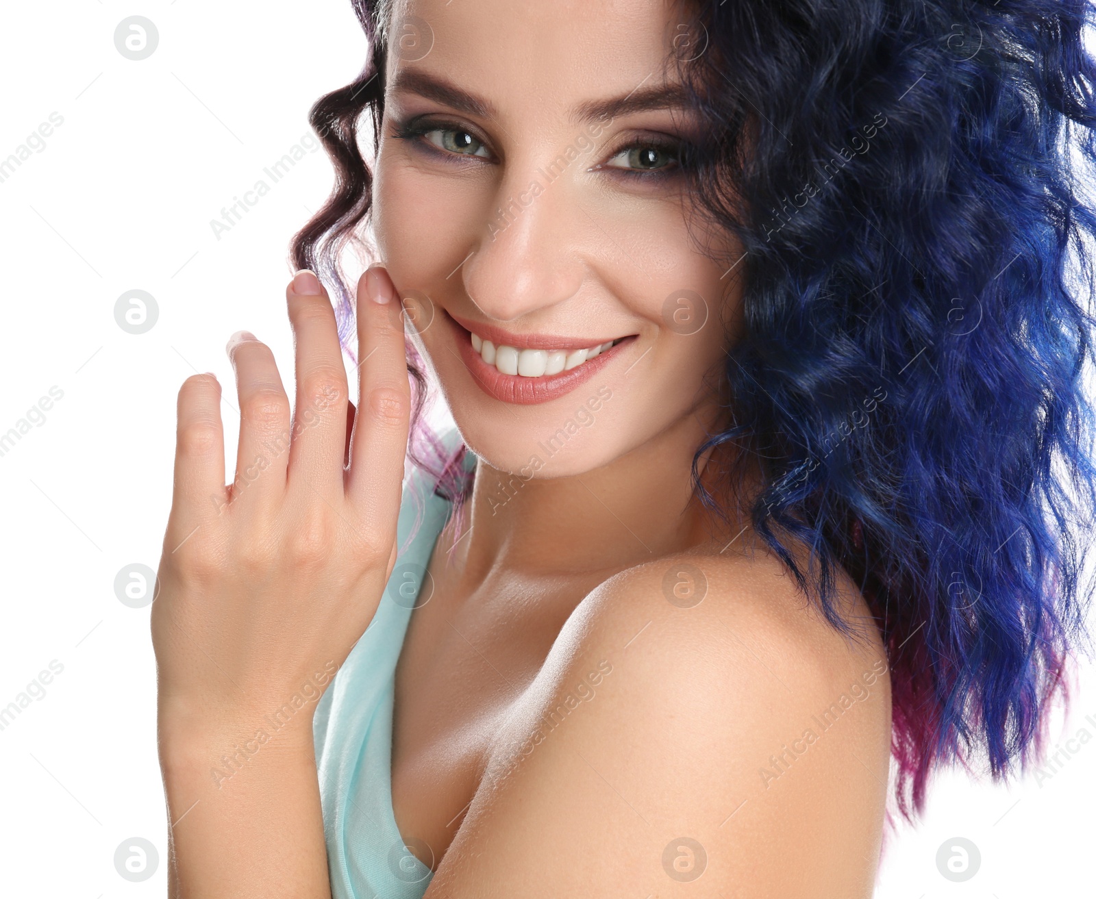 Photo of Young woman with bright dyed hair on white background, closeup