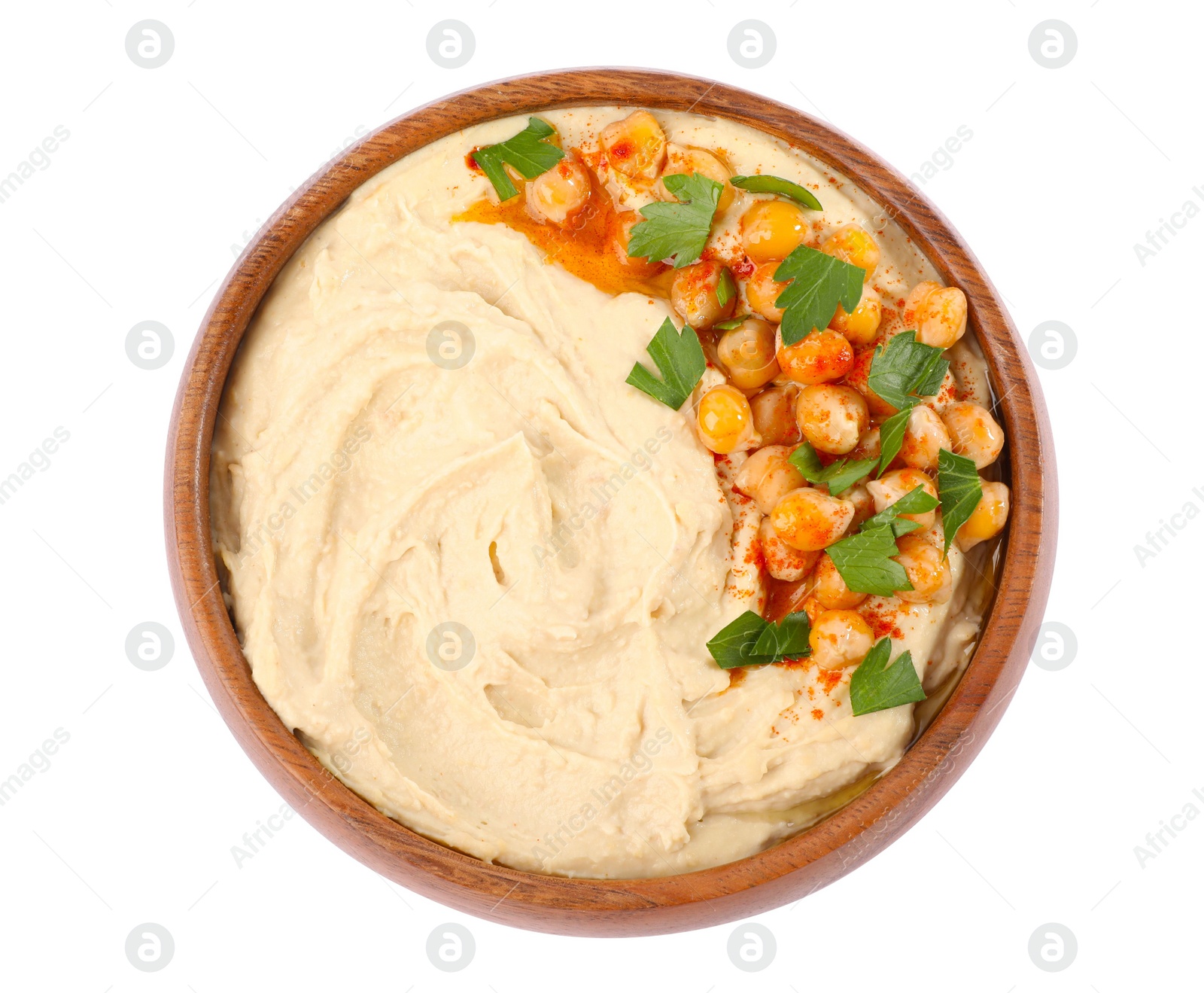 Photo of Bowl of tasty hummus with chickpeas isolated on white, top view