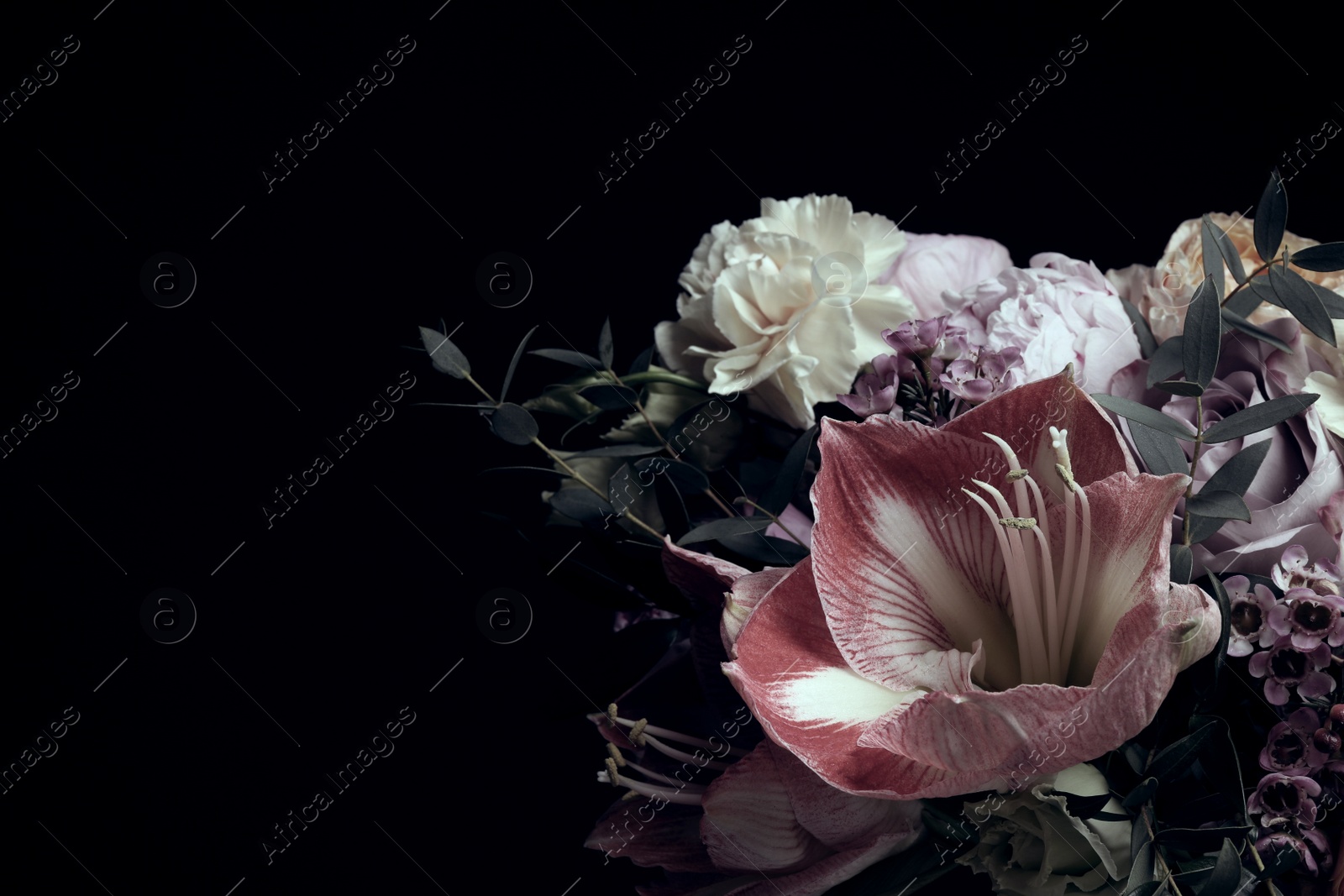 Photo of Beautiful bouquet of different flowers on black background, space for text. Floral card design with dark vintage effect