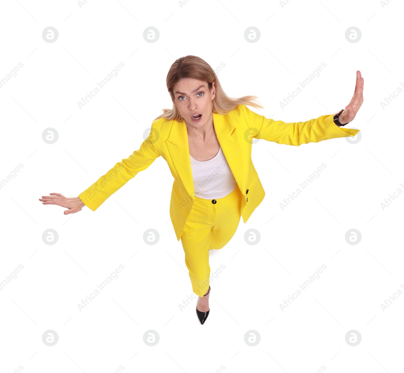 Photo of Beautiful emotional businesswoman posing on white background, above view
